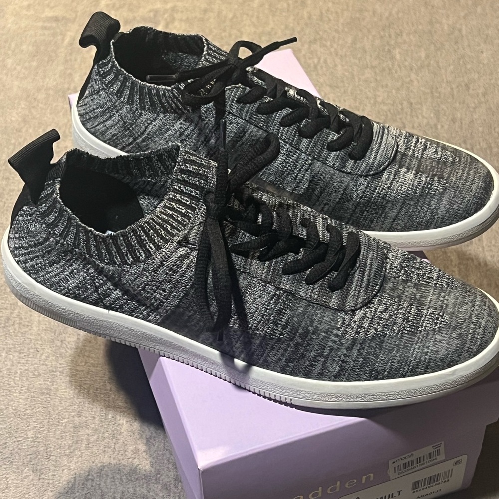 Black multi sneakers, slip one. With laces